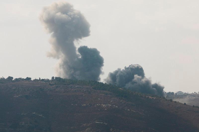 Smoke billows over Nabatieh area, amid ongoing hostilities between Hezbollah and Israeli forces, as seen from Marjayoun, near the Lebanese border with Israel, October 13, 2024. - REUTERS/Karamallah Daher