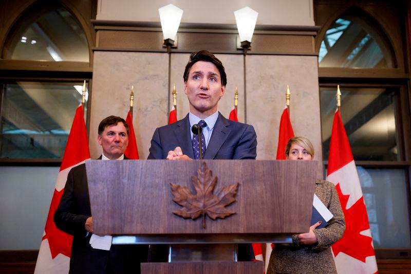 Canada’s Prime Minister Justin Trudeau, with Minister of Foreign Affairs Melanie Joly, and Minister of Public Safety, Democratic Institutions and Intergovernmental Affairs Dominic LeBlanc, takes part in a press conference about the Royal Canadian Mounted Police’s investigation into “violent criminal activity in Canada with connections to India”, on Parliament Hill in Ottawa, Ontario, Canada October 14, 2024. REUTERS.