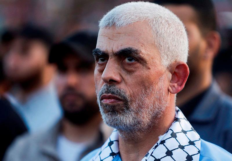 Hamas leader Yahya Sinwar looks on as Palestinian Hamas supporters take part in an anti-Israel rally over tension in Jerusalem’s Al-Aqsa mosque, in Gaza City October 1, 2022. - REUTERS/Mohammed Salem/File Photo