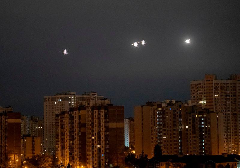 An explosion is seen in the sky over the city during a Russian drone strike, amid Russia's attack on Ukraine, in Kyiv, Ukraine October 19, 2024. - REUTERS/Vladyslav Sodel