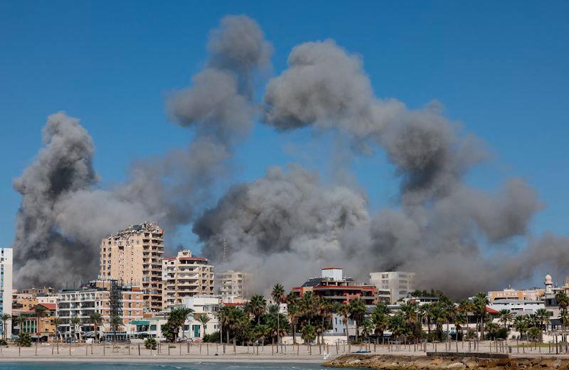 Smoke billows over the UNESCO-listed port city of Tyre after Israeli strikes, amid the ongoing hostilities between Hezbollah and Israeli forces, southern Lebanon October 23, 2024. - REUTERSPIX