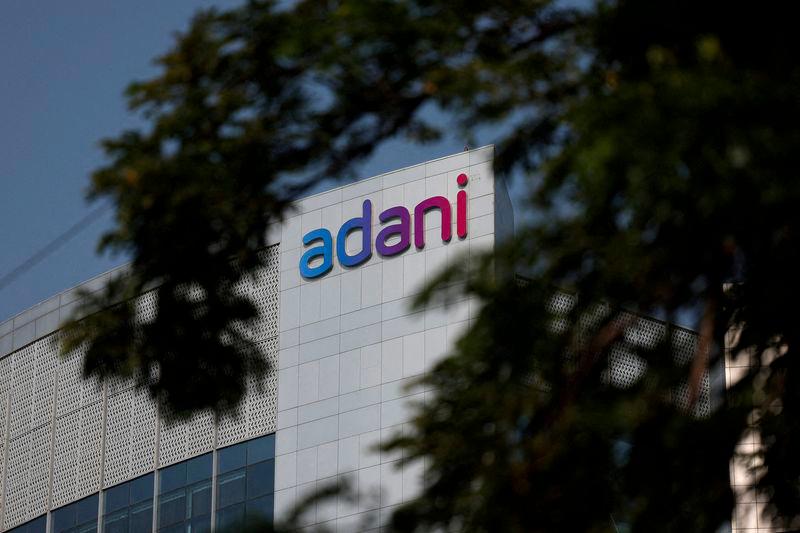 The logo of the Adani Group is seen on the facade of its Corporate House on the outskirts of Ahmedabad, India, November 21, 2024. - REUTERSPIX