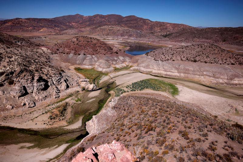 A general view of the dried Cogoti reservoir, as water levels in the zone dropped to record lows, ahead of World Water Day at La Ligua area, in Coquimbo, Chile March 14, 2024. - REUTERSPIX