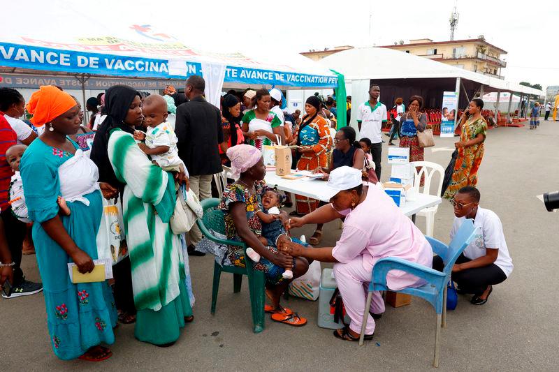 A health employee gives a malaria injection to a child during the official ceremony for the launch of the malaria vaccination campaign for children aged between zero and eleven months in Abobo a district of Abidjan, Ivory Coast July 15, 2024. REUTERS/Luc Gnago/File Photo