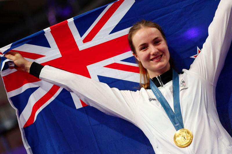 Paris 2024 Olympics - Track Cycling - Women's Sprint, Victory Ceremony - Saint-Quentin-en-Yvelines Velodrome, Montigny-le-Bretonneux, France - August 11, 2024.Gold medallist Ellesse Andrews of New Zealand celebrates on the podium. - REUTERSPIX