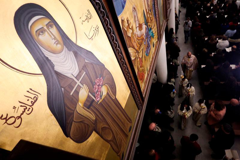 Christians attend a Christmas mass at the Lady of Damascus church, after the ousting of Syria’s Bashar al-Assad, in Damascus, Syria - REUTERSpix