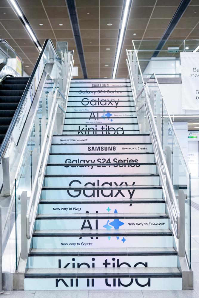 $!The station’s stairs are vibrant and welcoming with aesthetically-pleasing branding.