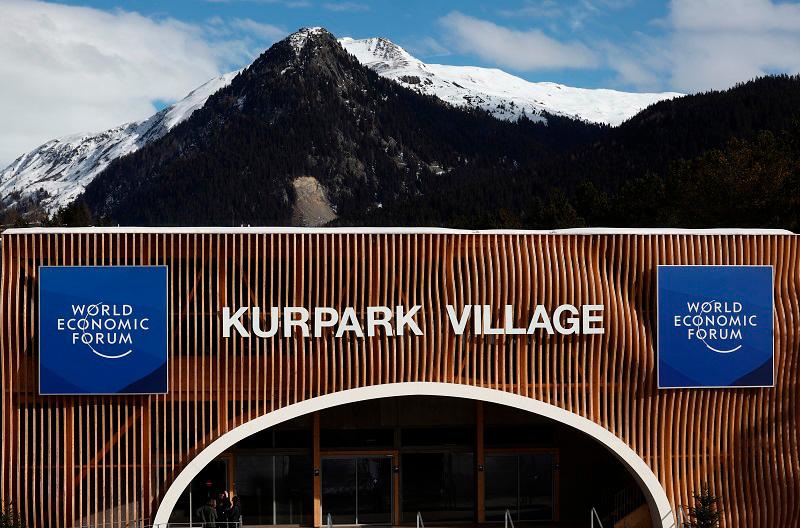 Logos of the World Economic Forum (WEF) are seen at the entrance of the media center ahead of the WEF in Davos, Switzerland January 19, 2025. - REUTERS/Yves Herman