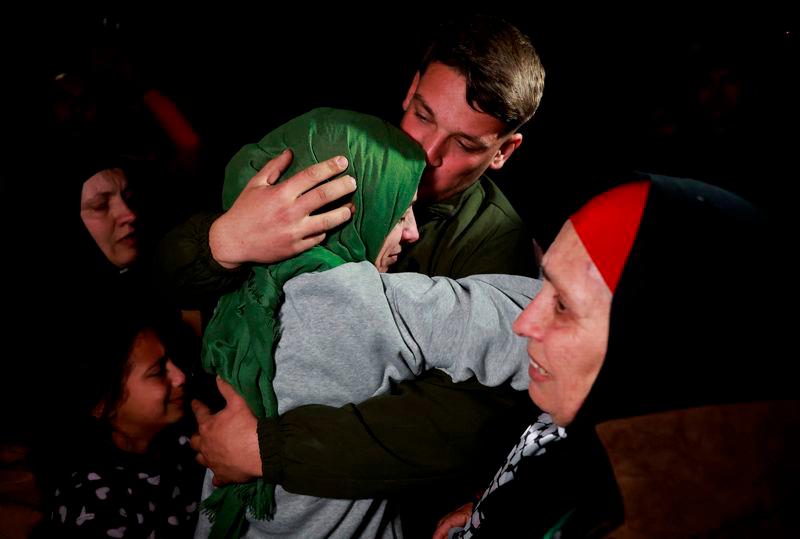 A freed Palestinian prisoner is greeted after being released from an Israeli jail as part of a hostages-prisoners swap and a ceasefire deal in Gaza between Hamas and Israel, in Ramallah - REUTERSpix