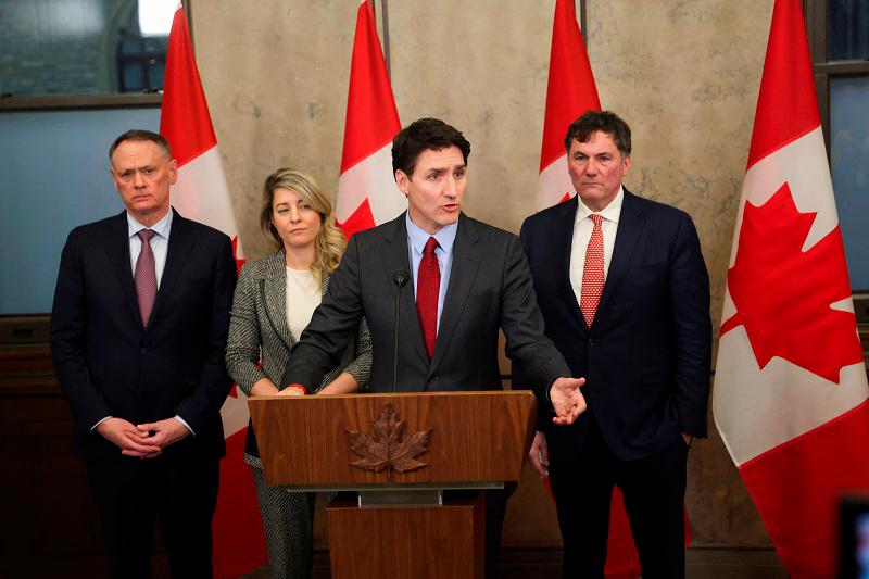 Canada’s Prime Minister Justin Trudeau is joined by Finance Minister Dominic LeBlanc, Minister of Foreign Affairs Melanie Joly, and Minister of Public Safety David McGuinty, as he speaks during a press conference while responding to U.S. President Donald Trump’s orders to impose 25% tariffs on Canadian imports, in Ottawa, Ontario, Canada February 1, 2025. - REUTERS/Patrick Doyle