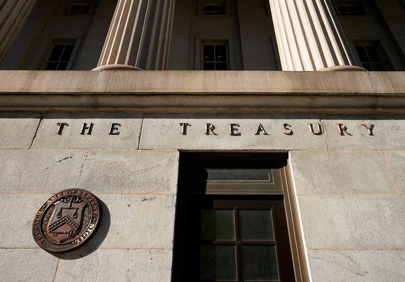 A view shows a bronze seal beside a door at the U.S. Treasury building in Washington, U.S., January 20, 2023. - REUTERSPIX