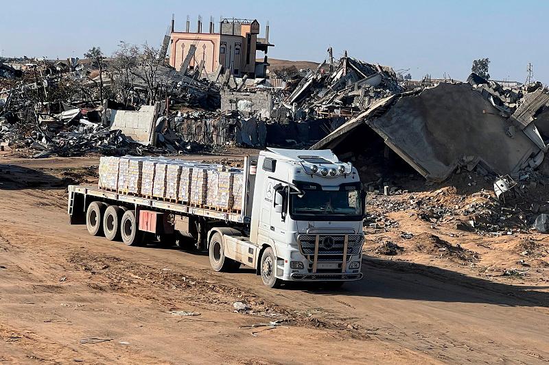 A truck carrying aid moves, amid a ceasefire between Israel and Hamas, in Rafah in the southern Gaza Strip, February 13, 2025. - REUTERS/Hussam Al-Masri