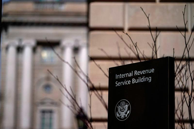 A sign stands outside the U.S. Internal Revenue Service (IRS) building after it was reported the IRS will lay off about 6,700 employees, a restructuring that could strain the tax-collecting agency's resources during the critical tax-filing season, in Washington, D.C., February 20, 2025. - REUTERSPIX