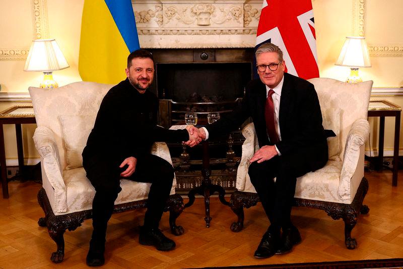 British Prime Minister Keir Starmer and Ukrainian President Volodymyr Zelenskiy shake hands during a bilateral meeting - REUTERSpix