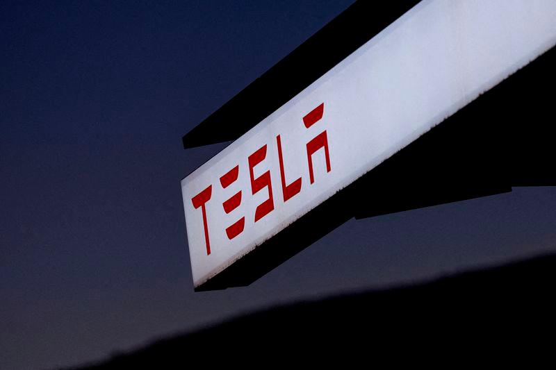 FILE PHOTO: A view of Tesla logo at an electric vehicle charging station between Los Angeles and Las Vegas in Baker, California. FILEpix - REUTERSpix