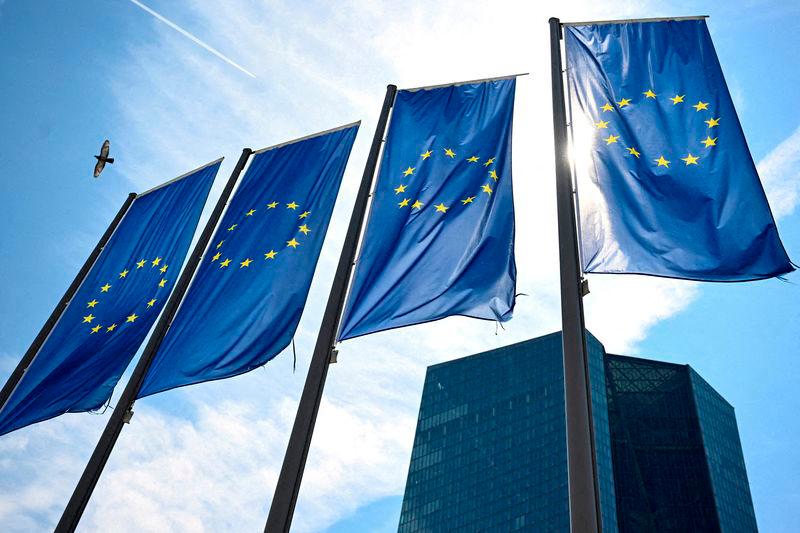 FILE PHOTO: EU flags flutter in front of European Central Bank headquarters in Frankfurt, Germany. REUTERSpix