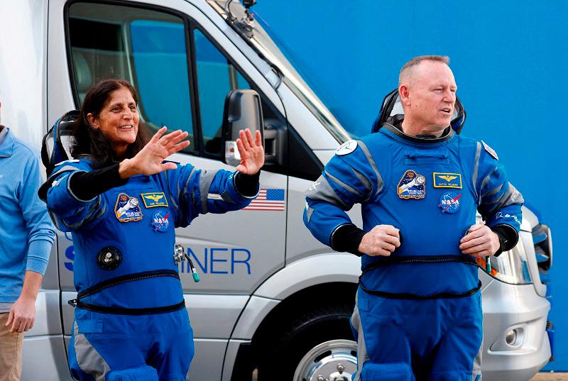 NASA astronauts Butch Wilmore and Suni Williams stand at NASA’s Kennedy Space Center, on the day of Boeing’s Starliner-1 Crew Flight Test (CFT) mission on a United Launch Alliance Atlas V rocket to the International Space Station, in Cape Canaveral, Florida, U.S., June 1, 2024. - REUTERS/Joe Skipper/File Photo