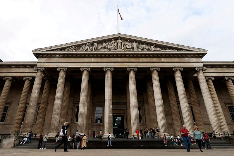 People walk in front of the British Museum in London, Britain. - REUTERS/Hollie Adams/File Photo