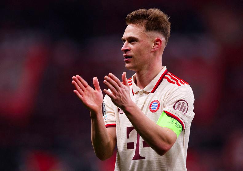 Football - Champions League - Round of 16 - Second Leg - Bayer Leverkusen v Bayern Munich - BayArena, Leverkusen, Germany - March 11, 2025Bayern Munich's Joshua Kimmich celebrates after winning the match - REUTERSPIX