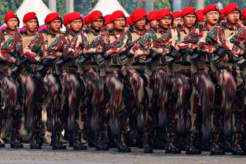 FILEpix: Indonesian Military Special Forces personnel march during the 79th Indonesian Military Anniversary celebrations at the National Monument (Monas) complex in Jakarta, Indonesia, REUTERSpix