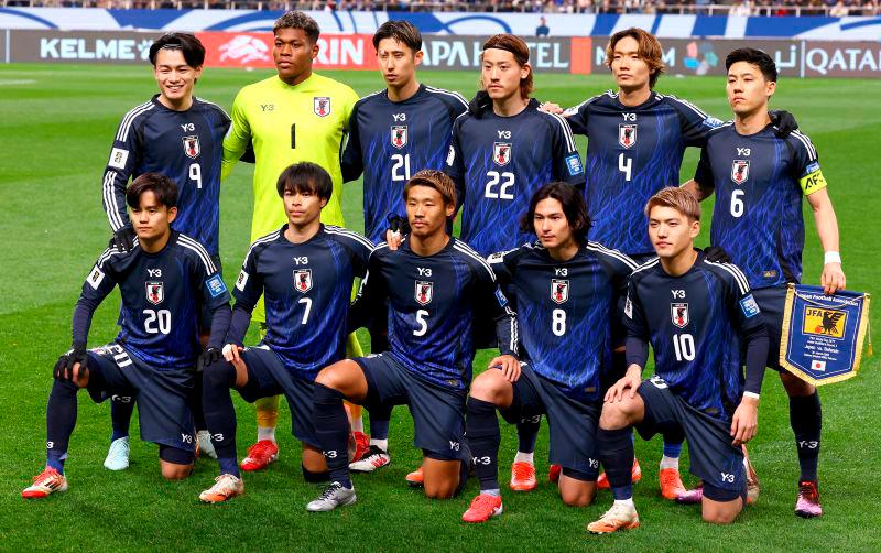 Japan players pose for a team picture before the match REUTERSpix