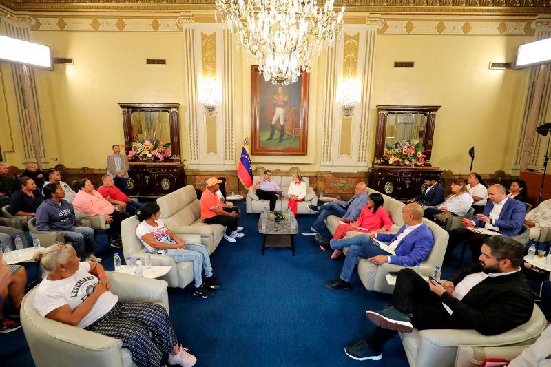 Venezuela President Nicolas Maduro and his wife Cilia Flores meet with family members of Venezuelans held in a high-security prison in El Salvador after being deported from the U.S., at Miraflores Palace, in Caracas. REUTERSpix