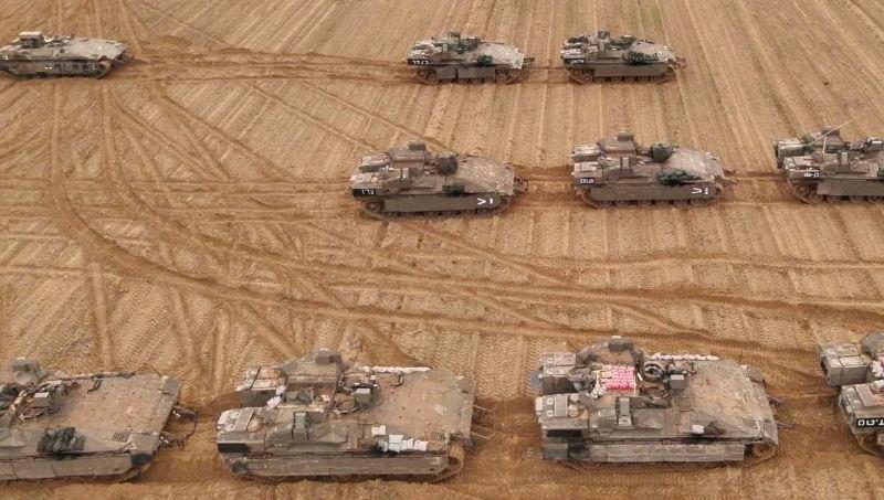 A view shows armoured vehicles as the Israeli military has said its 36th Division, which has been deployed in Lebanon, has begun preparations for possible activity in Gaza, amid the Israel-Hamas conflict, at an unknown location, in this undated handout image released March 23, 2025. REUTERSpix