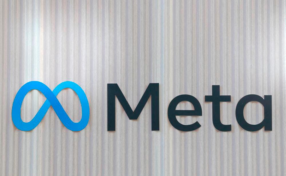 The logo of Meta is seen at the entrance of the company’s temporary stand ahead of the World Economic Forum (WEF) in Davos, Switzerland January 18, 2025. REUTERSpix