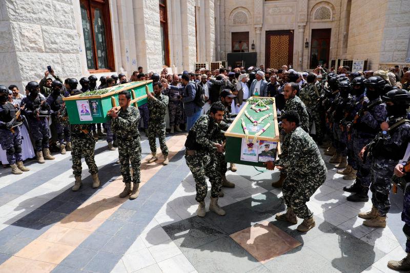 Soldiers carry the coffin of sons of Houthi chieftain Saleh al-Suhaili during the funeral of two sons and two daughters of Saleh al-Suhaili, who according to local Houthi media were killed by U.S. strikes on his house, in Sanaa, Yemen April 17, 2025. REUTERSpix