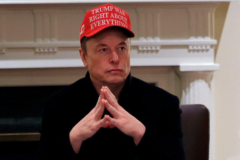 FILEpix: Tesla CEO Elon Musk wears a ‘Trump Was Right About Everything!’ hat while attending a cabinet meeting at the White House, in Washington, D.C., U.S., March 24, 2025. REUTERSpix