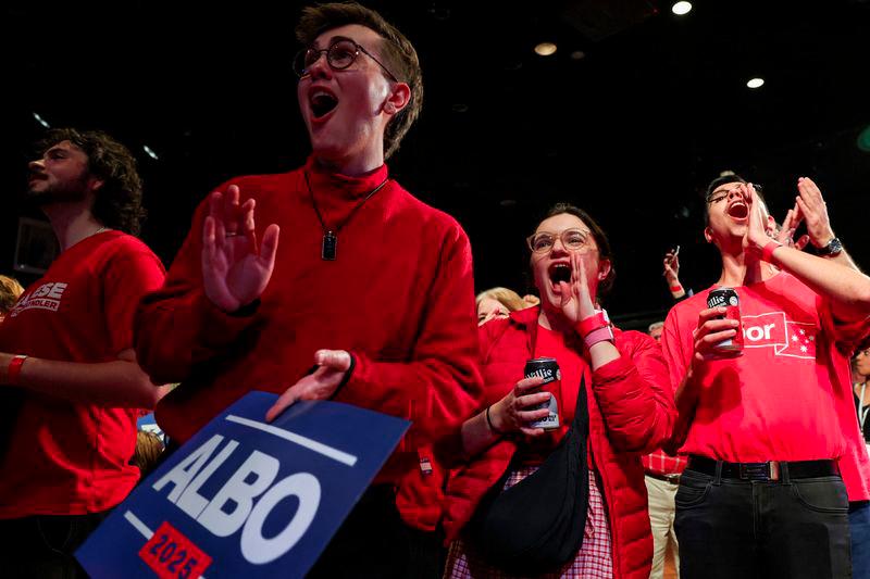 Supporters of Australia's Prime Minister Anthony Albanese react at a Labor party election night event, after local media projected the Labor Party's victory, on the day of the Australian federal election, in Sydney, Australia, May 3, 2025. - REUTERSPIX