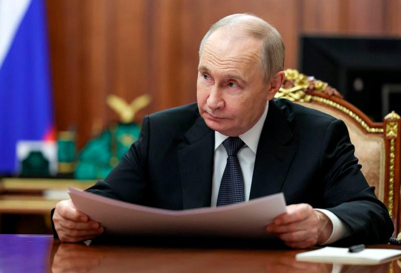 Russian President Vladimir Putin attends a meeting with Moscow Mayor Sergei Sobyanin at the Kremlin in Moscow, Russia May 5, 2025. REUTERSpix