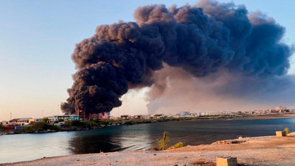 A view shows a large plume of smoke and fire rising from fuel depot in Port Sudan, Sudan, May 6, 2025. REUTERSpix