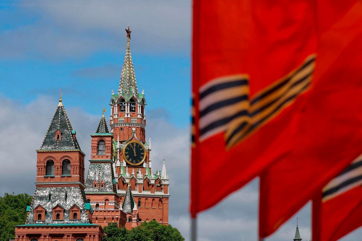 Flags fly in front of towers of the Kremlin on the eve of Victory Day marking the 80th anniversary of the victory over Nazi Germany in World War Two, in central Moscow, Russia, May 8, 2025. REUTERSpix