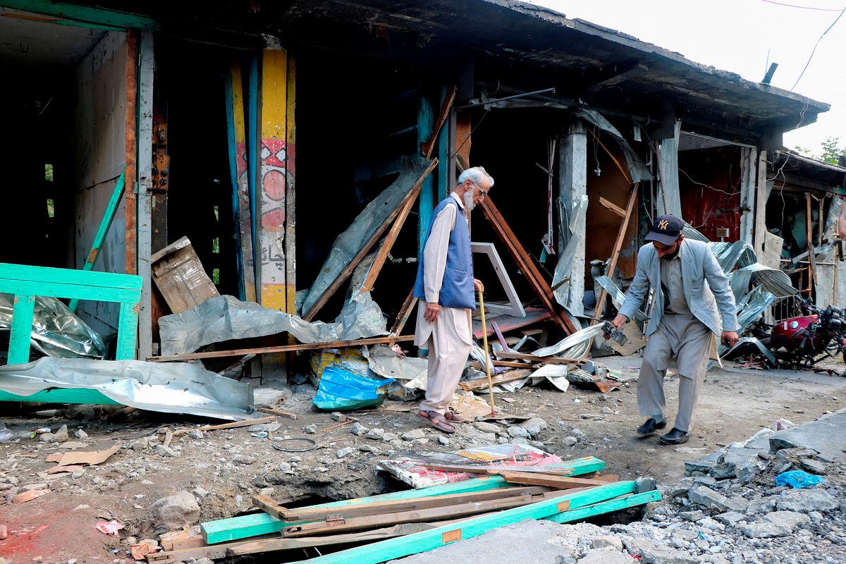 Residents assess the damage of their shops after they were hit in an Indian strike, following the ceasefire announcement between India and Pakistan, in Jura village in Neelum Valley, Pakistani Kashmir, May 12, 2025. - REUTERSPIX