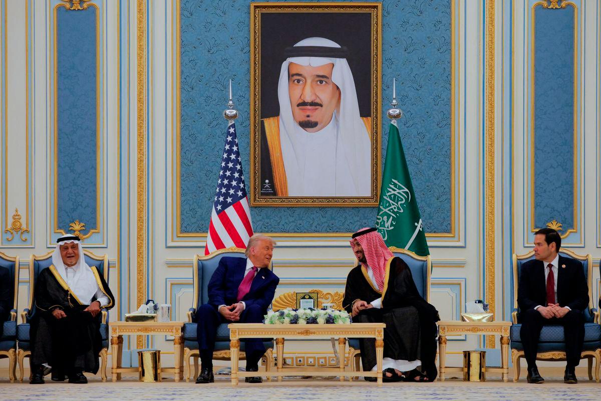 U.S. President Donald Trump and Saudi Crown Prince Mohammed Bin Salman speak as they meet in Riyadh, Saudi Arabia, May 13, 2025. REUTERSPIX