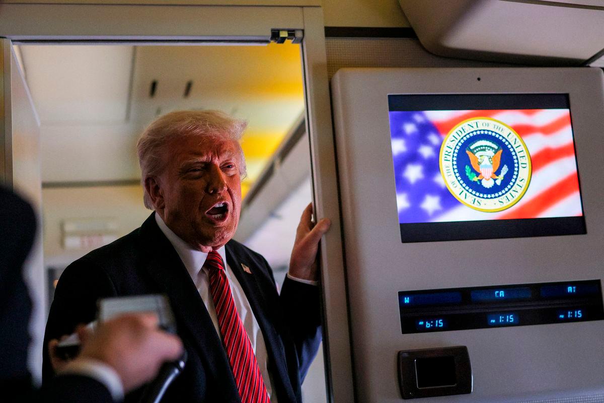 Trump speaks to the press on board Air Force One en route to Doha, Qatar, May 14, 2025. REUTERSpix