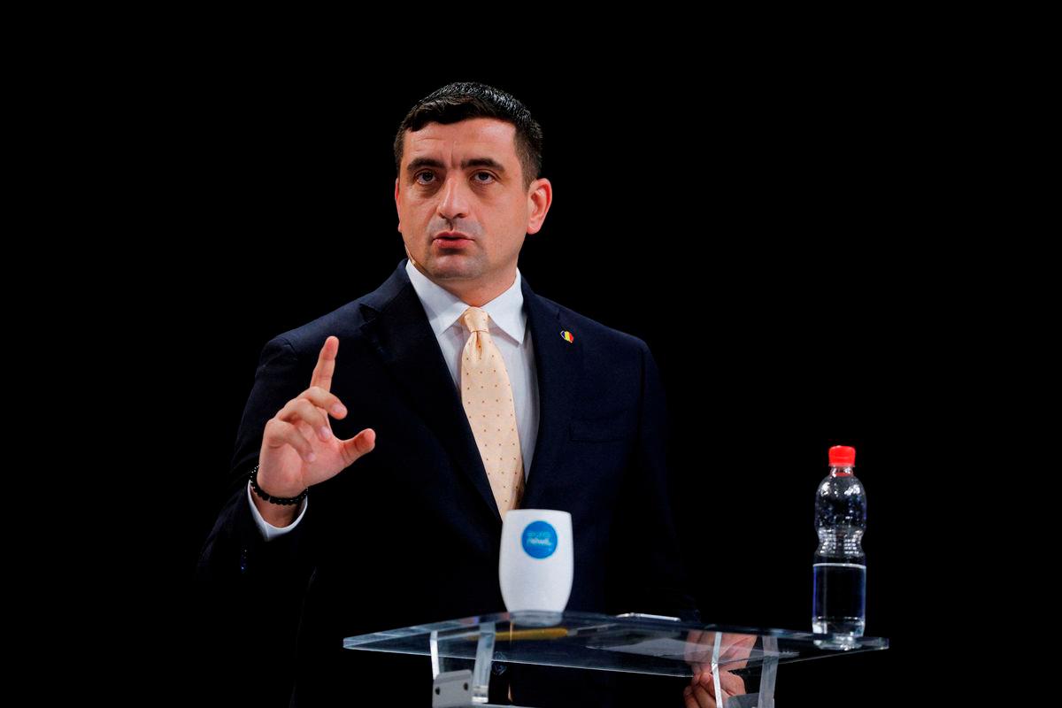 George Simion gestures while attending a presidential debate alongside Nicusor Dan (not pictured), in Bucharest, Romania, May 8, 2025. REUTERSpix