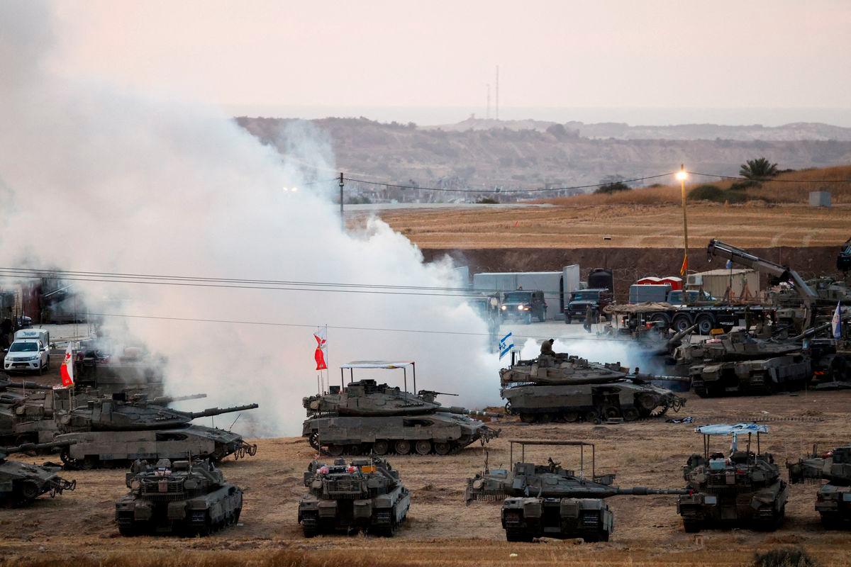 Israeli military vehicles stand near the Israel-Gaza border, in Israel, May 15, 2025. REUTERSpix