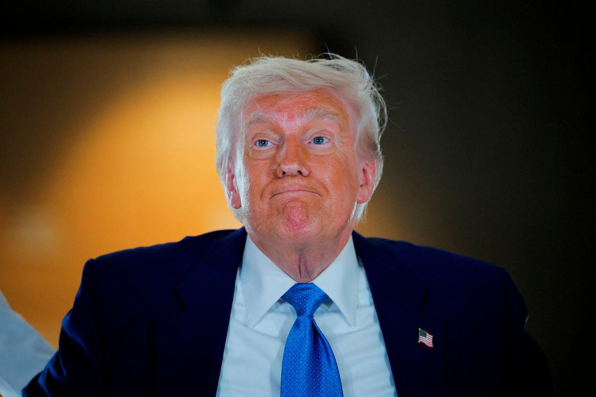 U.S. President Donald Trump reacts as he visits the Abrahamic Family House during the final stop of his Gulf visit, in Abu Dhabi, United Arab Emirates, May 16, 2025. - REUTERSPIX