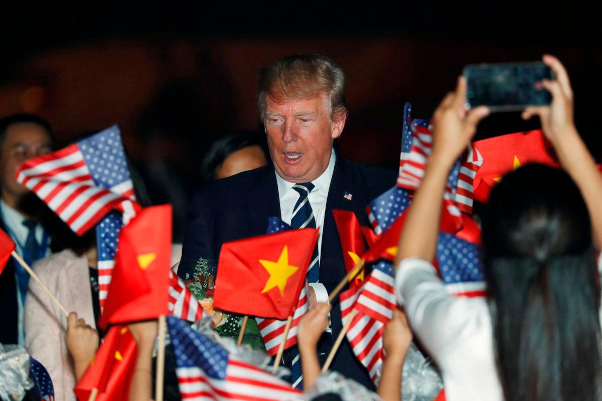 U.S. President Donald Trump arrives aboard Air Force One at Noi Bai International Airport in Hanoi, Vietnam November 11, 2017. REUTERSpix