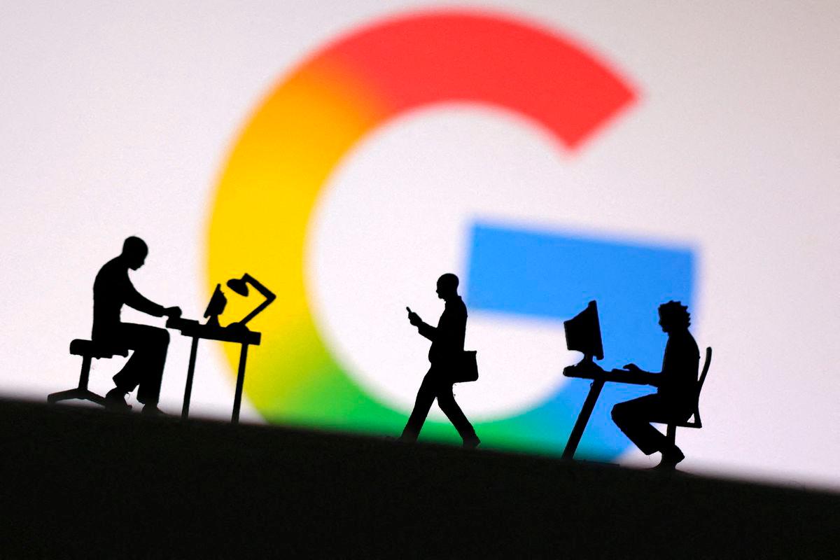 Miniature figures of people are seen in front of the new Google logo in this illustration taken May 13, 2025. REUTERSpix