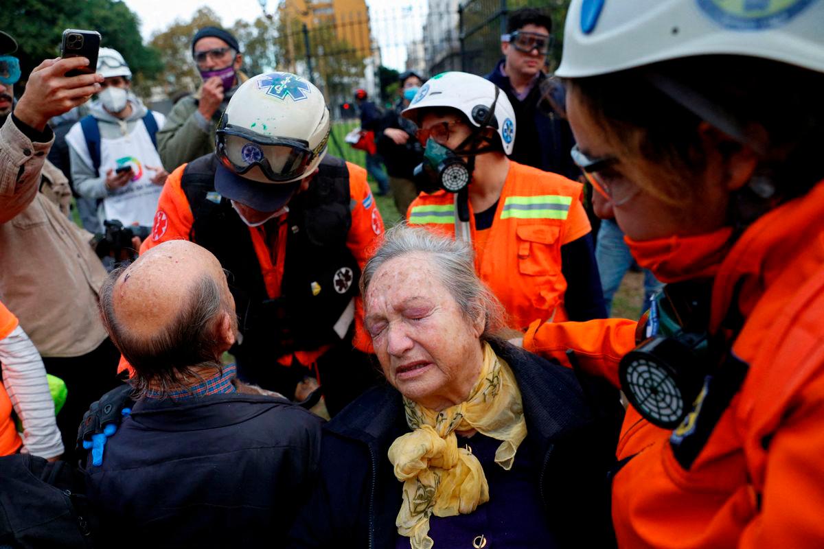 Healthcare workers help people during the weekly protest of pensioners against Argentine President Javier Milei’s austerity policies, outside the National Congress, in Buenos Aires, Argentina May 21, 2025. REUTERSpix