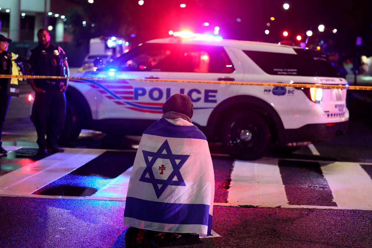 Emergency personnel work at the site where, according to the U.S. Homeland Security Secretary, two Israeli embassy staff were shot dead near the Capital Jewish Museum in Washington, D.C., U.S. May 21, 2025.REUTERSpix