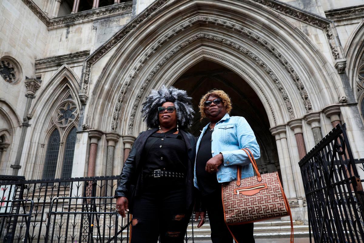 Bertrice Pompe and Bernadette Dugasse stand, following a court injunction that temporarily blocked the UK from concluding Chagos Islands deal with Mauritius, outside the High Court in London, Britain, May 22, 2025. REUTERSpix