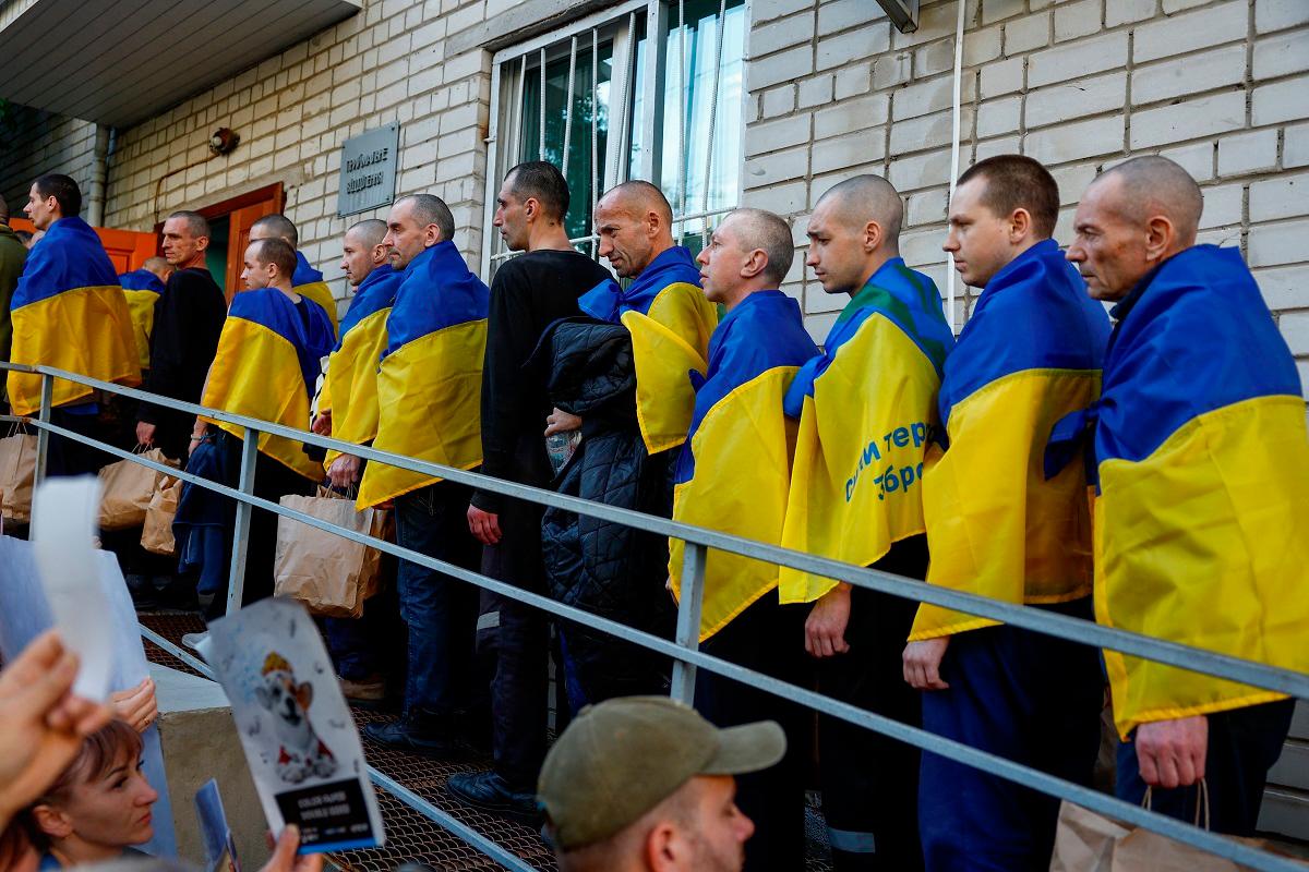 Ukrainian prisoners of war (POWs) are seen after they return after a swap, amid Russia's attack on Ukraine, in an undisclosed location in Ukraine, May 23, 2025. - REUTERS/Valentyn Ogirenko