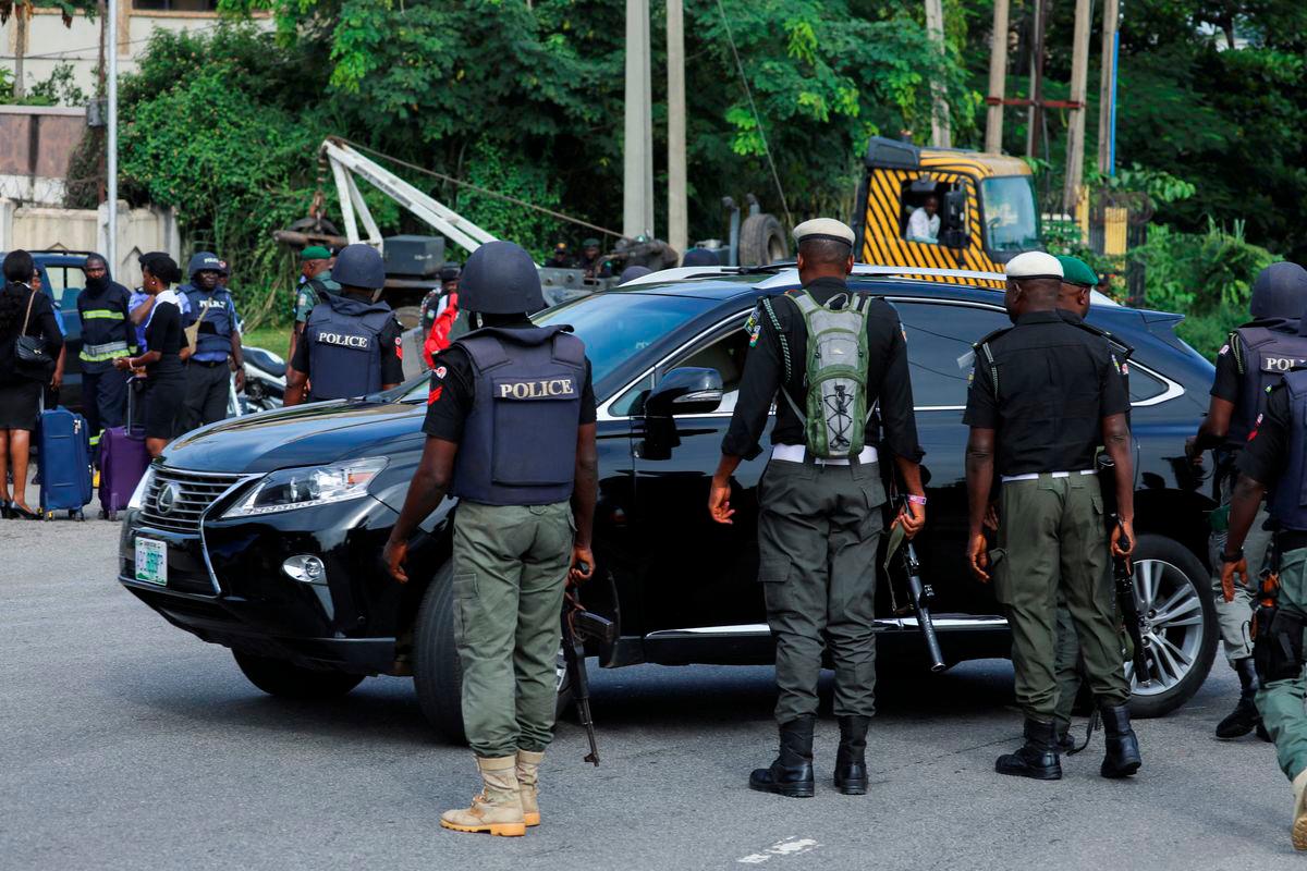 Police officers are seen conducting checks on vehicles at the Federal High court in Abuja, Nigeria October 21, 2021. REUTERSpix