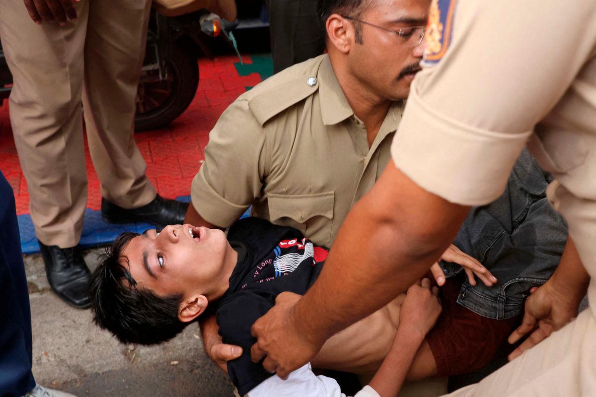A boy lies unconscious following a stampede outside a cricket stadium in Bengaluru, India, June 4, 2025. REUTERS.