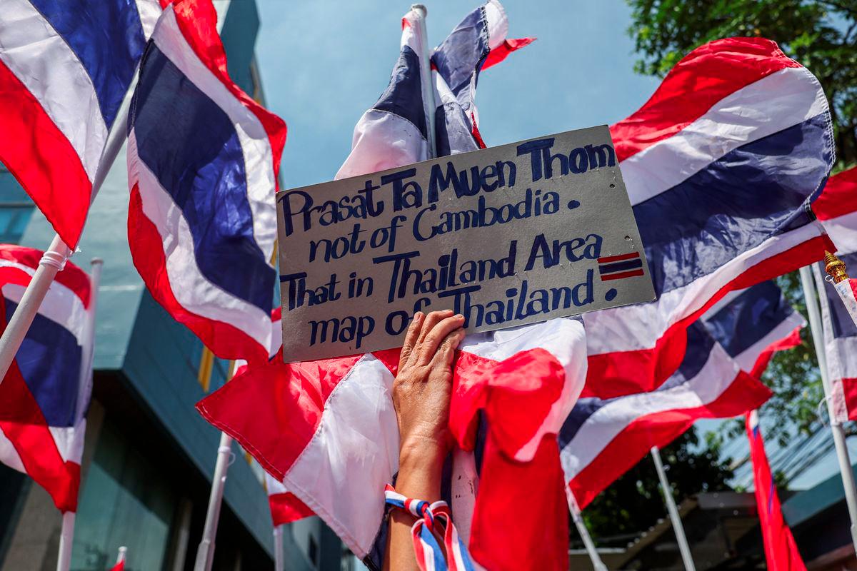A royalist activist holds a placard as she protests in front of the Royal Embassy of Cambodia, following a recent clash at the Thailand-Cambodia border on May 28, 2025, in Bangkok, Thailand, June 6, 2025. - REUTERSPIX