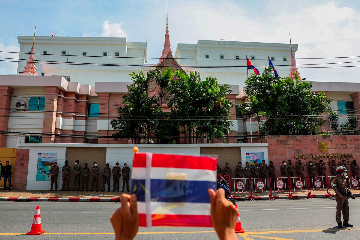 A royalist activist holds a Thai flag as he protests in front of the Royal Embassy of Cambodia, following a recent clash at the Thailand-Cambodia border on May 28, 2025, in Bangkok, Thailand, June 6, 2025. - REUTERSPIX